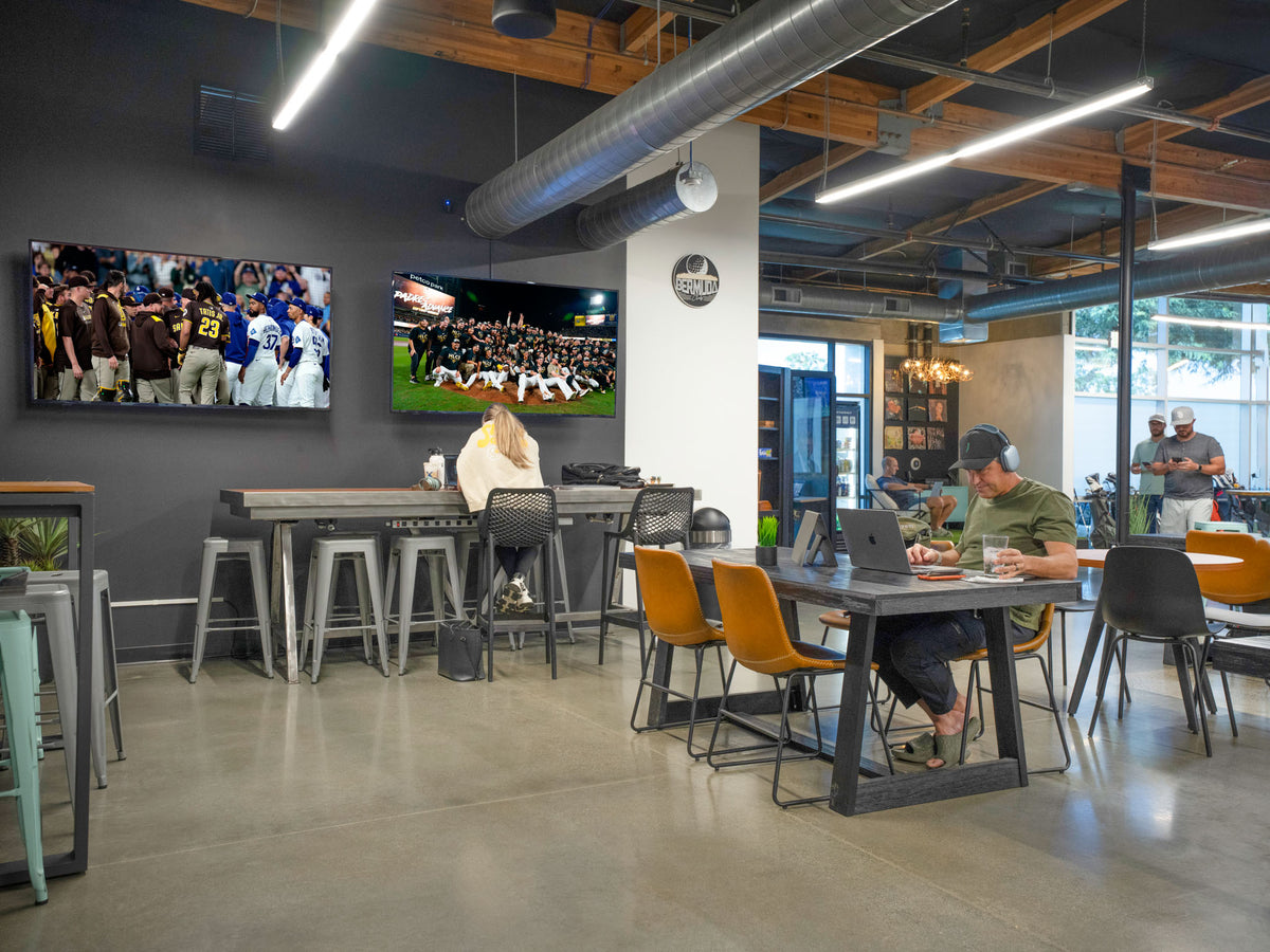 A lively workspace with good music, sports on TV, and people who actually talk to each other 